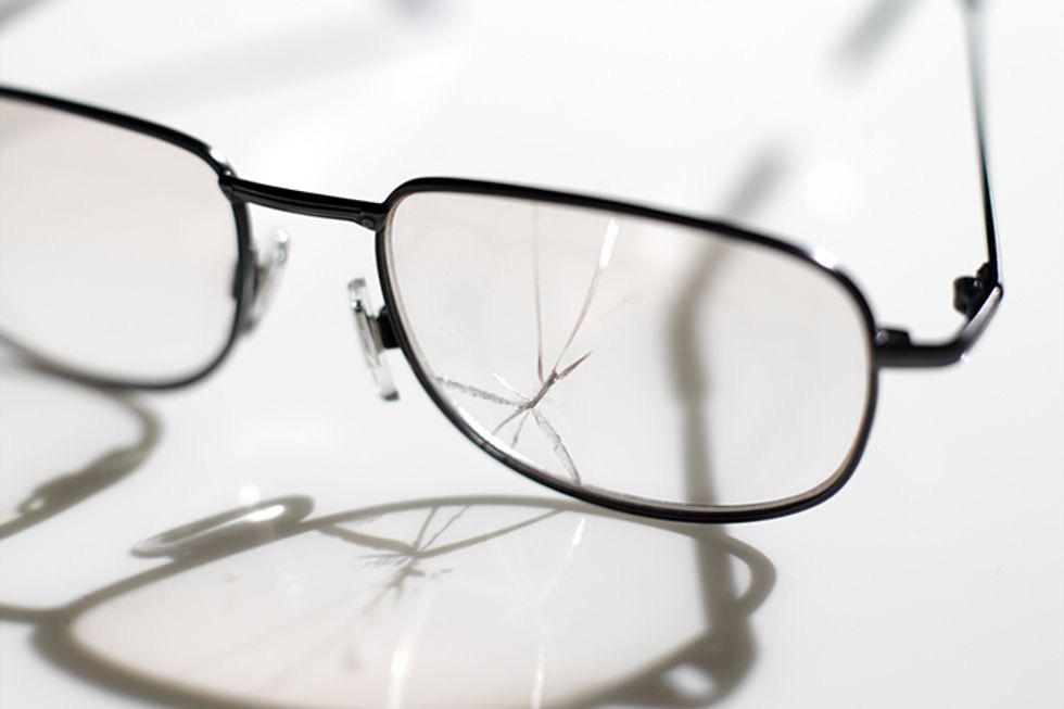 A Pair of Glasses with a Broken Lens